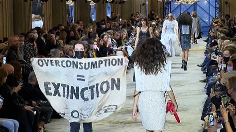 Video. Climate protesters invade the Louis Vuitton fashion show 